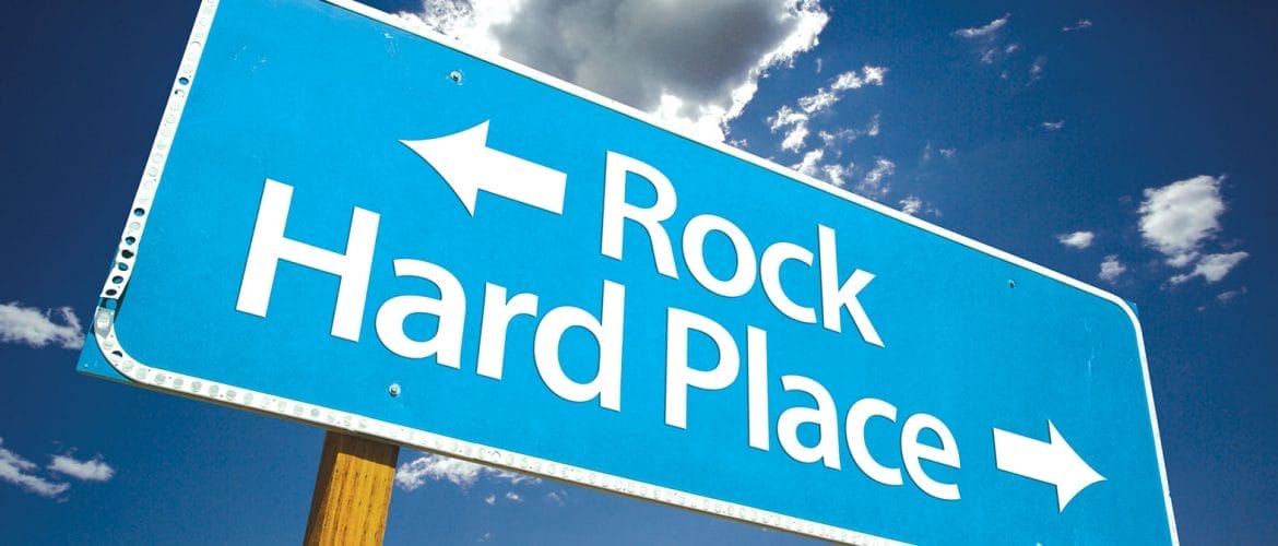 Rock And Hard Place Sign